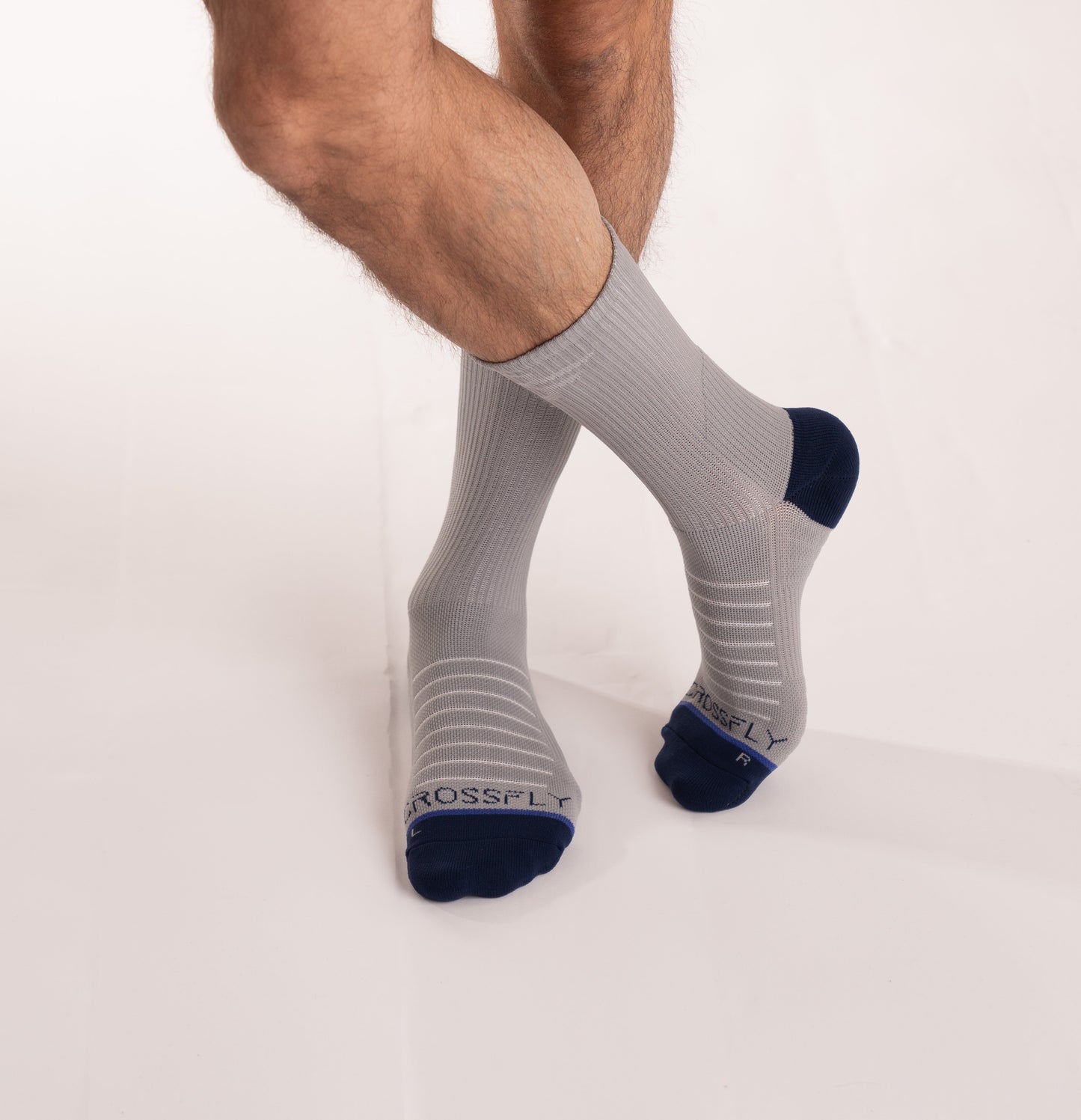 Crossfly men's Hero Crew Socks in grey from the Performance series, featuring AirBeams and 180 Hold.