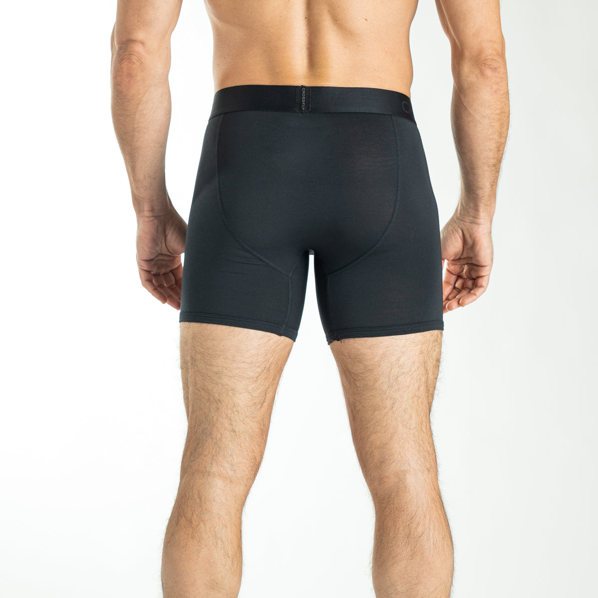 Model wear the Crossfly IKON 6&quot; Boxer in Black. Photo is of back of model showing the back section of Crossfly IKON 6&quot; Boxers in black.